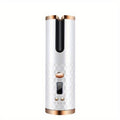 White electronic device with rose gold accents on a white background