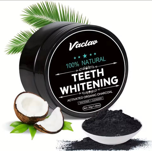 A black round tub of Vaclav teeth whitening powder with a black label, shown on a white background with coconut halves, green leaves, and a small white dish of the dark powder.