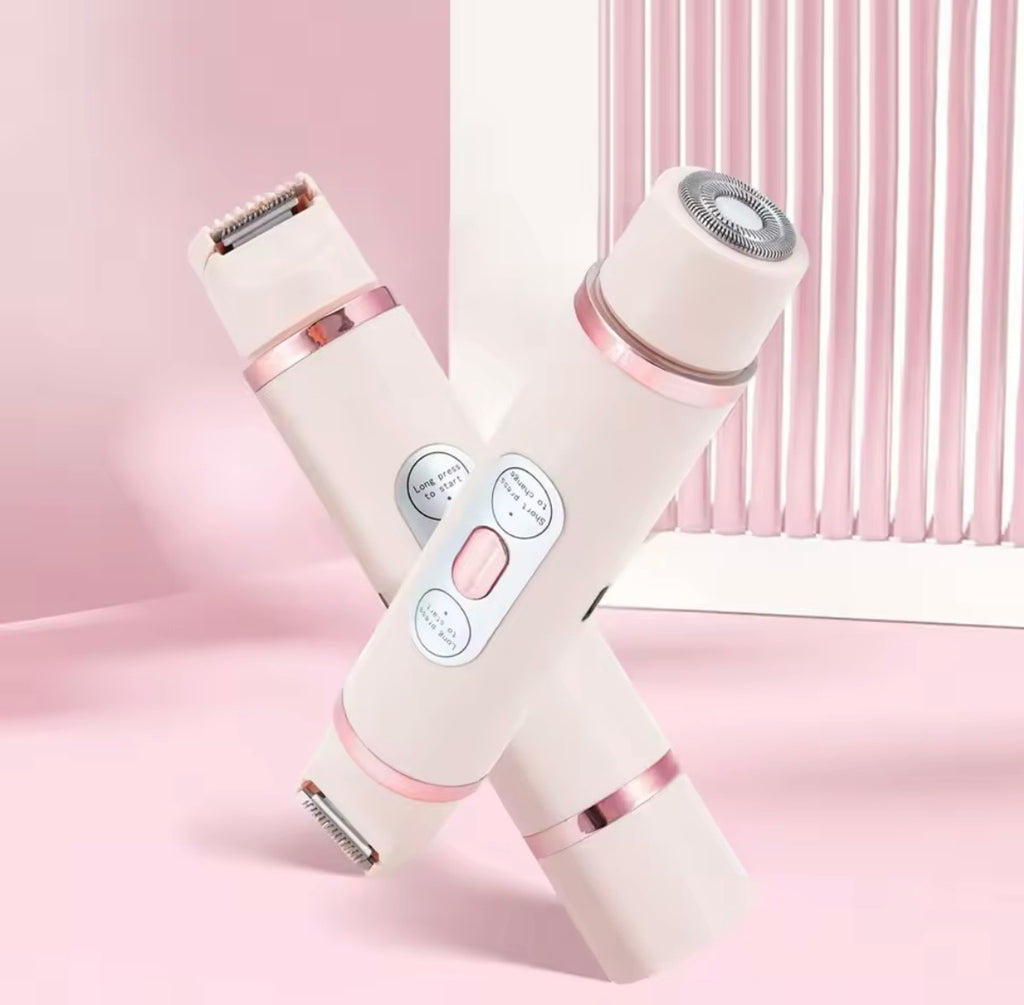 Two handheld electric shaver devices crossed in an X shape, shown against a soft pink background with a white slatted panel behind them.