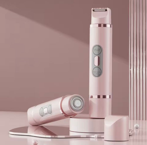 Pink and white grooming device on a reflective surface with a soft pink background