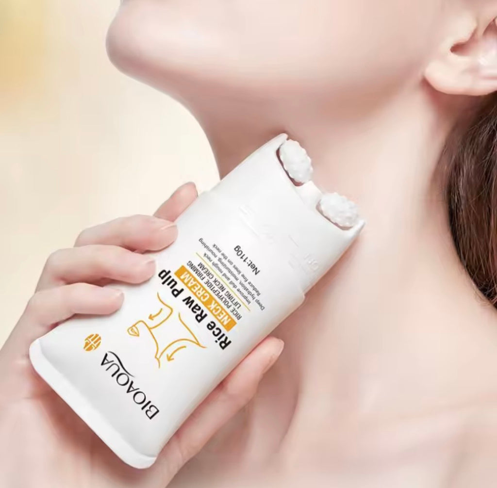 A close-up lifestyle shot of a woman holding a white Bioaqua Rice Raw Pulp hair growth shampoo bottle against her neck and shoulder, with a soft, warm beige background.